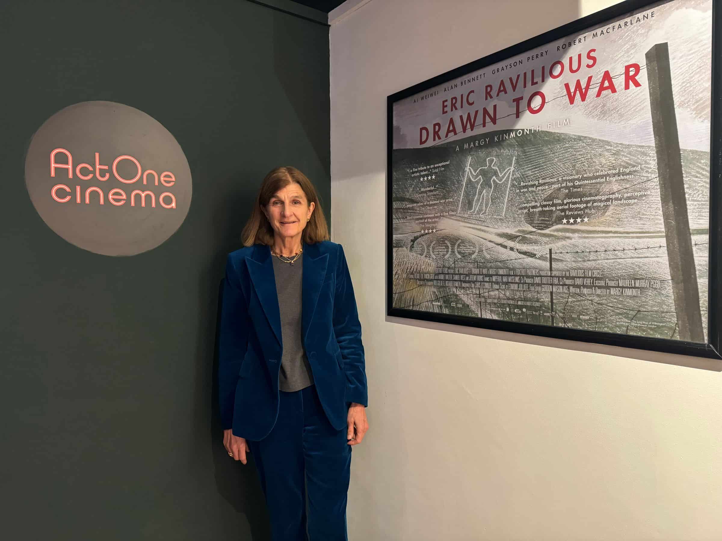 Director Margy Kinmonth standing next to Drawn to War film poster at ActOne Cinema London